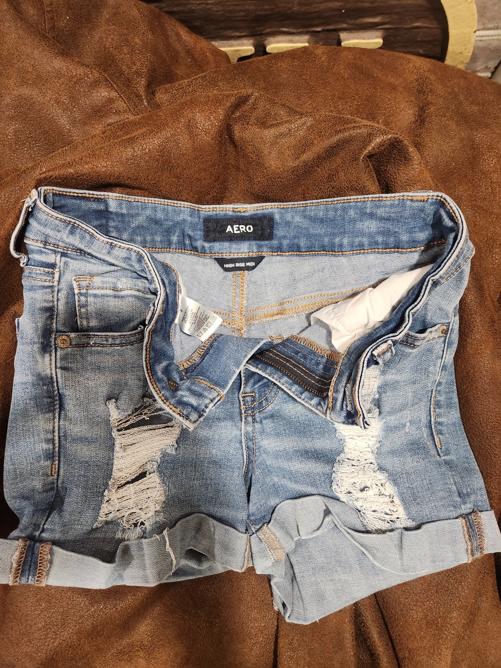 Aero High-Rise Distressed Light Blue Denim Shorts with Cuffed Hem